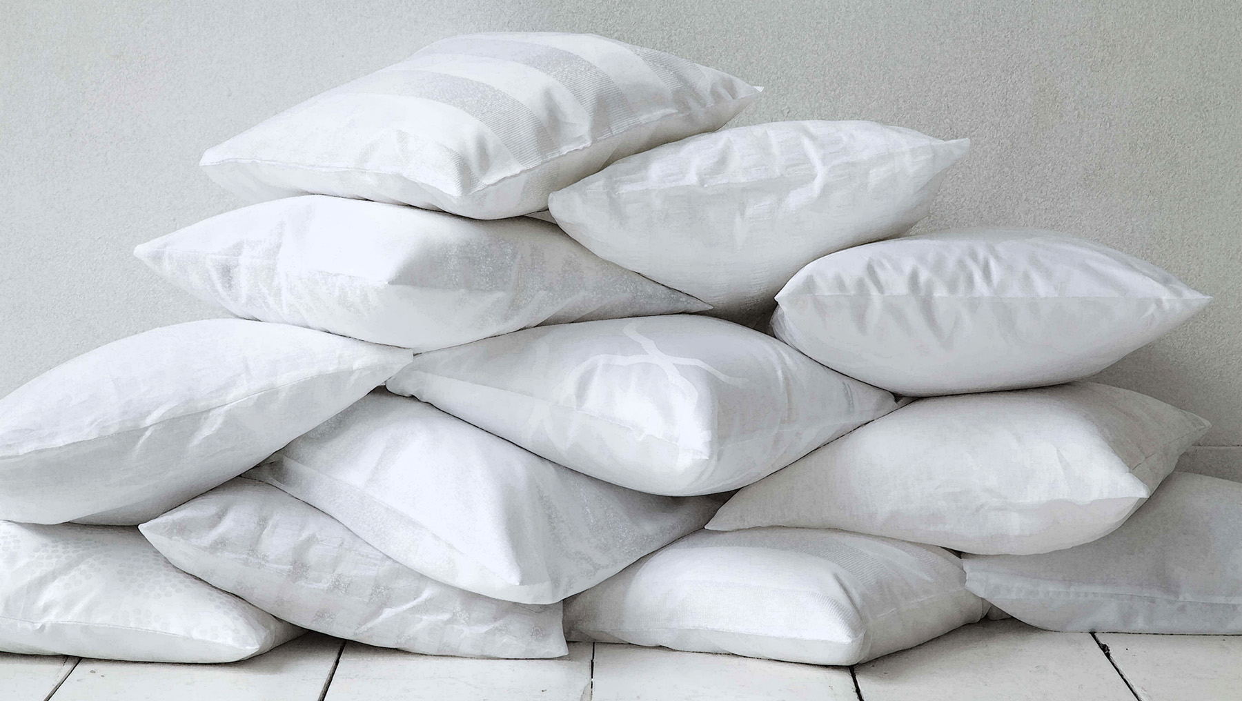 A stacked pile of pillows