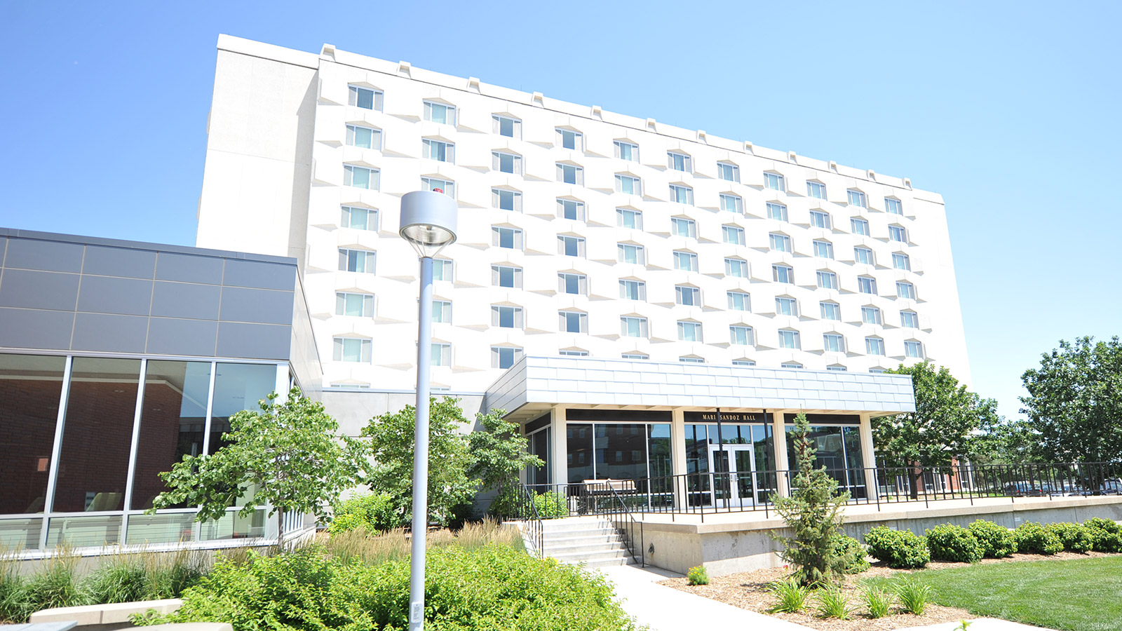 Sandoz Hall exterior in midday summer sun.